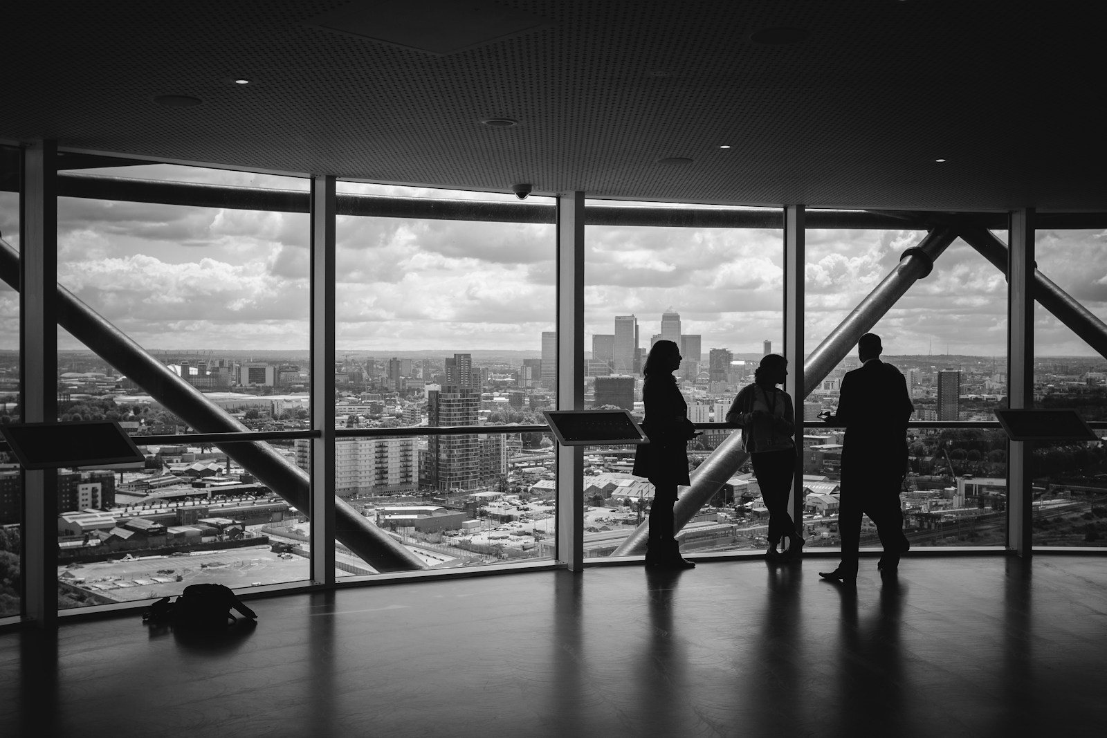 Professionals overlooking a city skyline